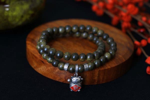 vc3b2ng-tay-tre1baa7m-hc6b0c6a1ng-mc3a8o-the1baa7n-tc3a0i-600x400-1 Vòng tay Trầm Hương Mèo Thần tài