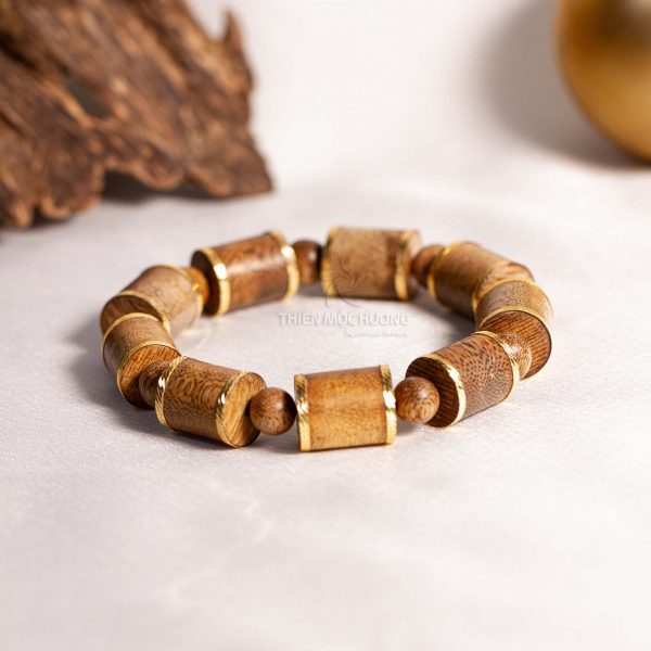 Vòng tay trầm hương Hoàng Kim Trụ bọc vàng