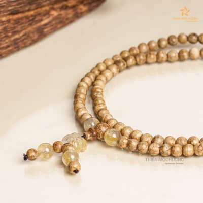 Vòng trầm hương 108 hạt Tứ Diệp Bảo Indo Vân Hoa Thạch Anh Tóc Vàng